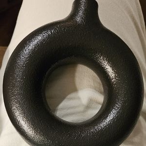 Black ceramic doughnut shaped flower/bud vase.  6" high, 5-1/2 wide.  🏷️